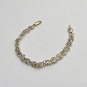 10k yellow and white gold panel bracelet.